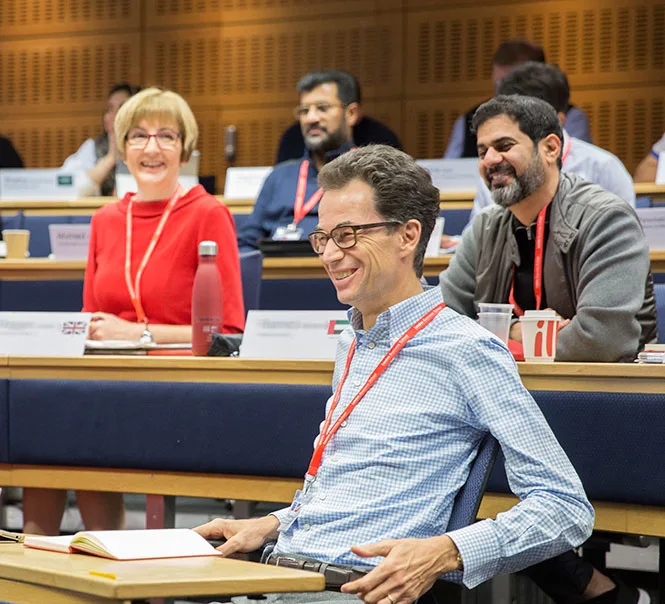 A group of people smiling