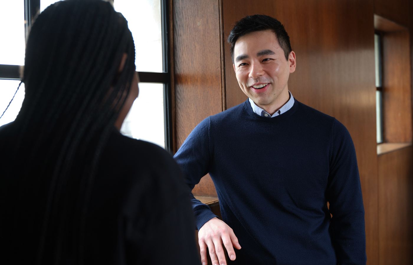 Man talking to woman