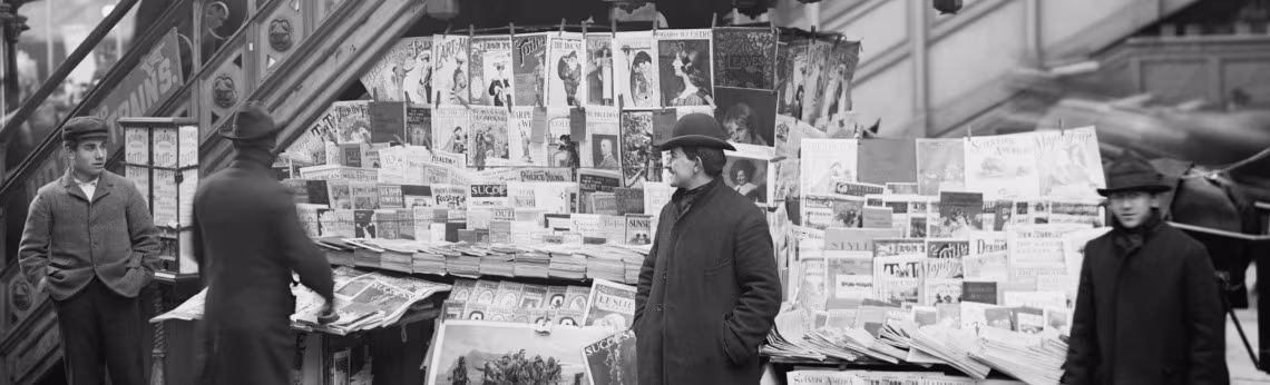 Historic photograph showing newspaper sellers